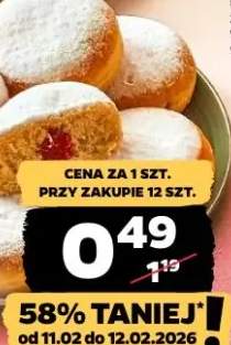 Pączek z nadzieniem wieloowocowym i cukrem pudrem