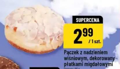 Pączek z nadzieniem wiśniowym, dekorowany płatkami migdałowymi