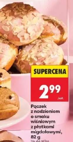 Pączek z nadzieniem o smaku wiśniowym z płatkami migdałowymi