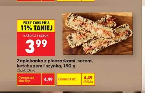 Zapiekanka z pieczarkami serem ketchupem i szynką